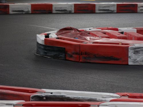 An instructor coaching a young driver